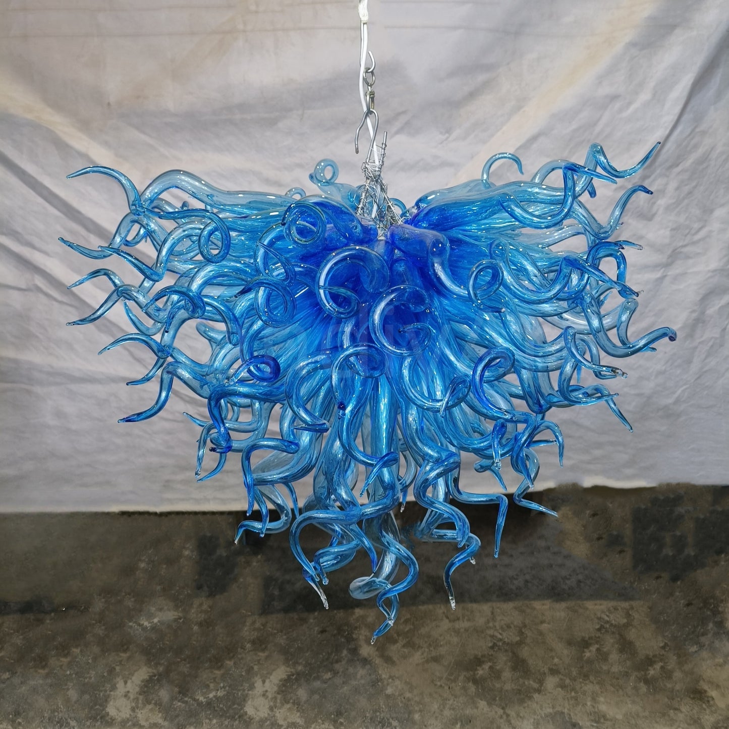 Contemporary blue mouth blown glass chandelier Mysterious atmosphere