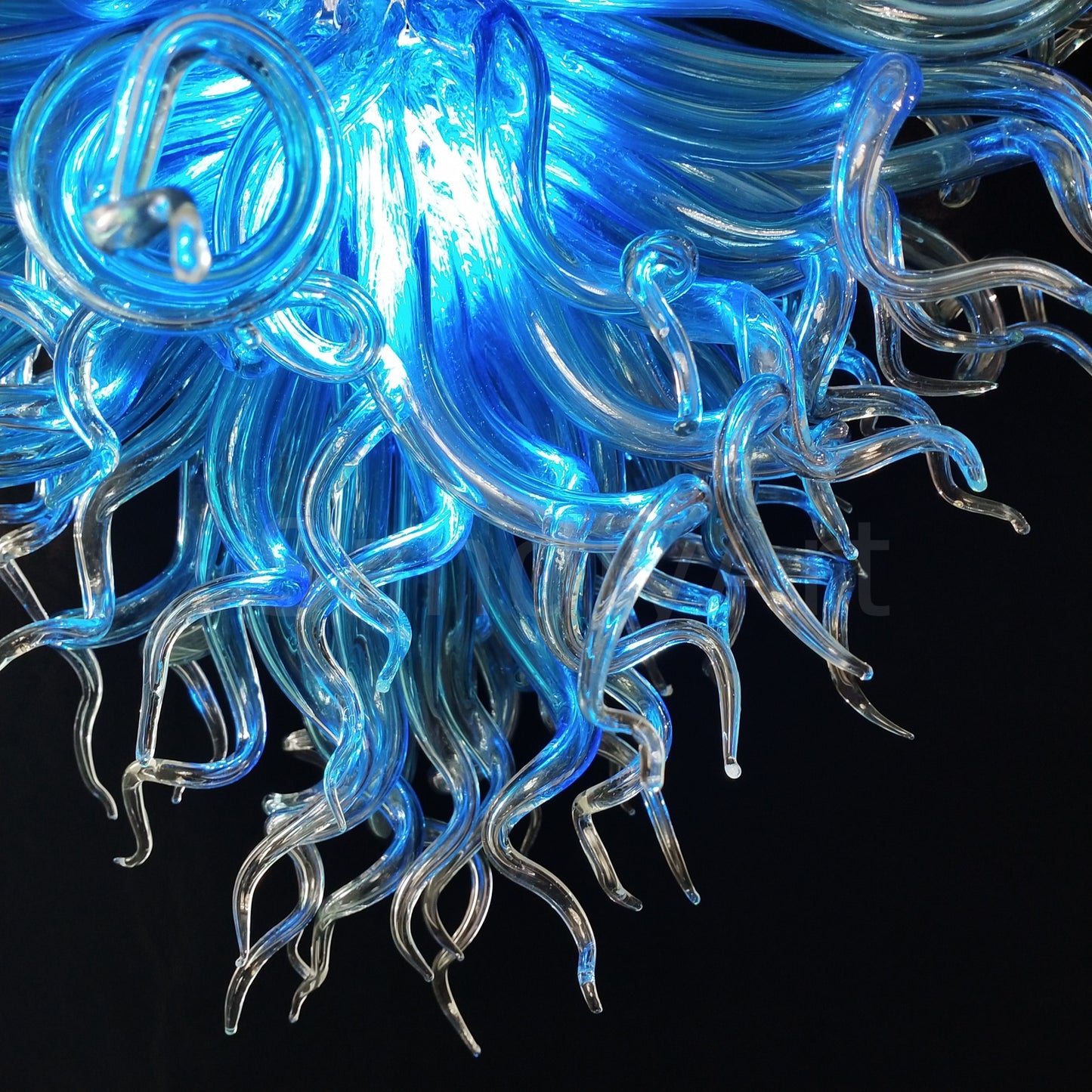 Blue with clear custom blown glass chandeliers Inspired by Chihuly style lighting