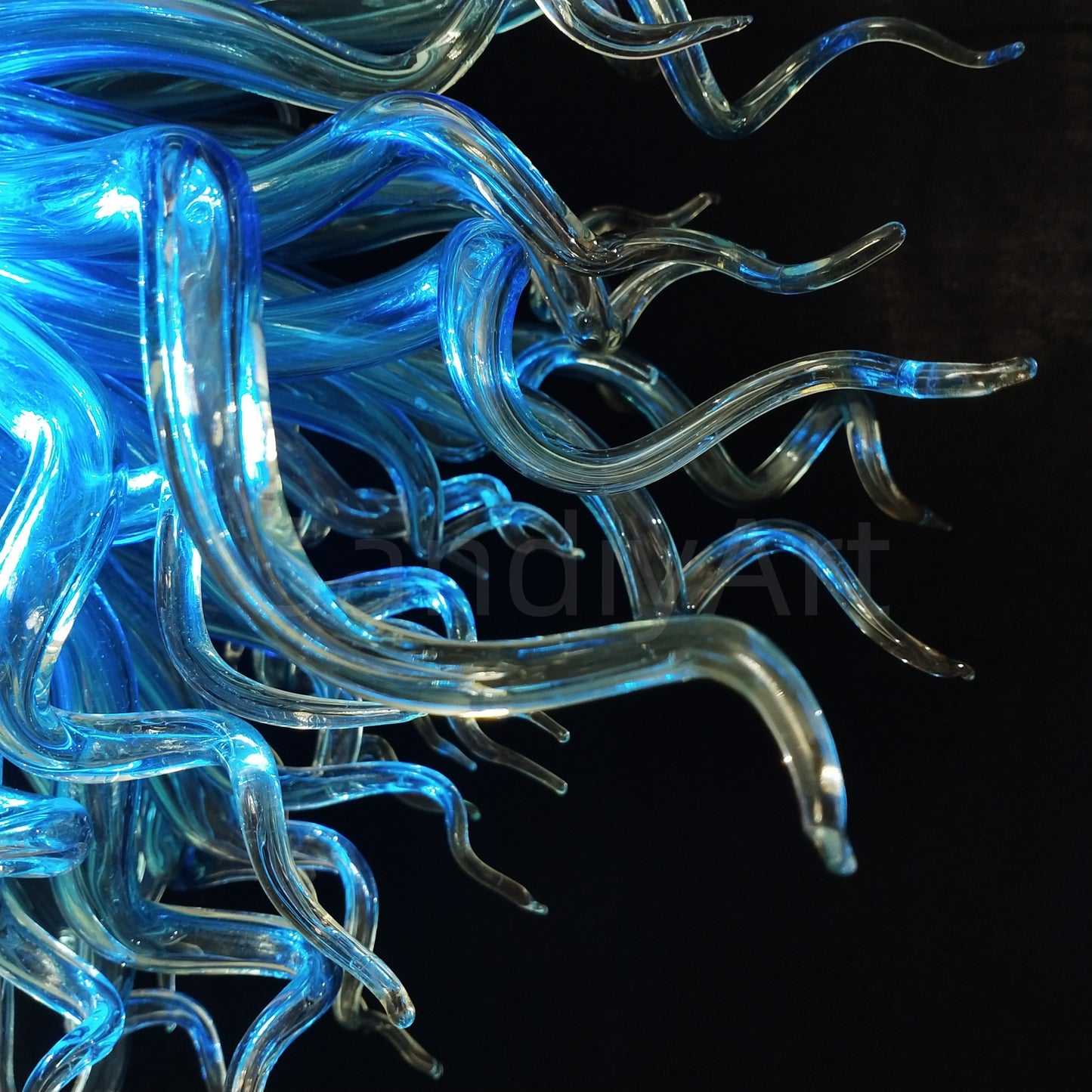Blue with clear custom blown glass chandeliers Inspired by Chihuly style lighting