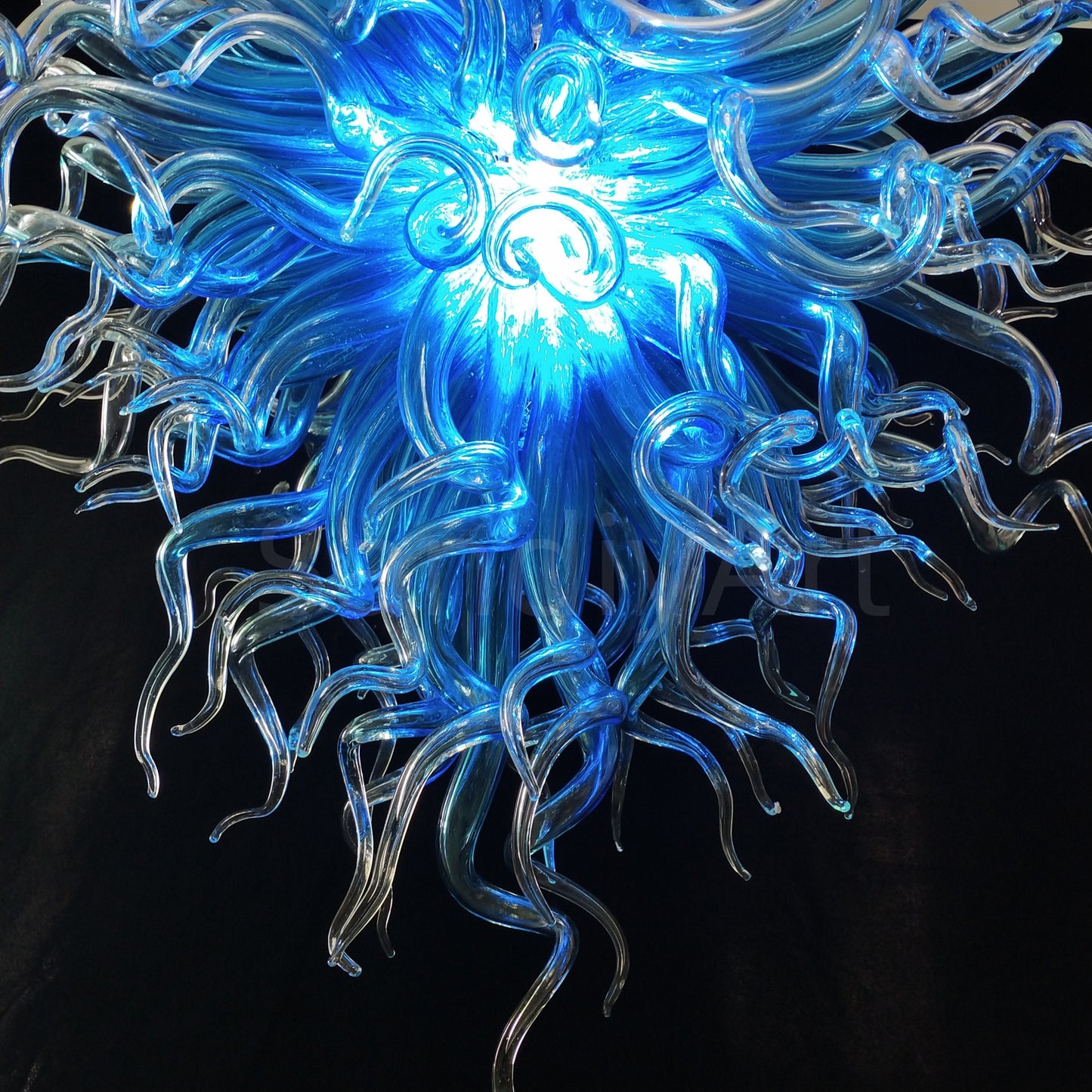 Blue with clear custom blown glass chandeliers Inspired by Chihuly style lighting