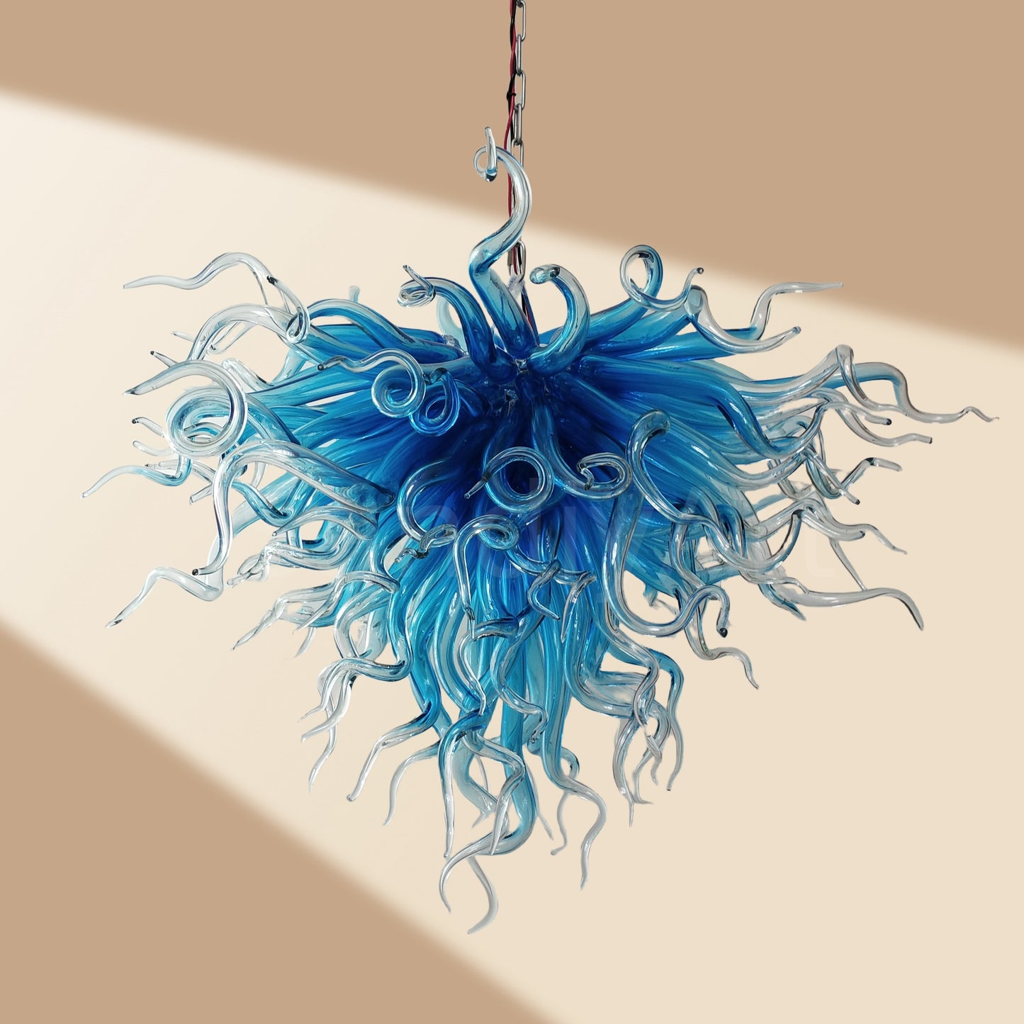 Blue with clear custom blown glass chandeliers Inspired by Chihuly style lighting