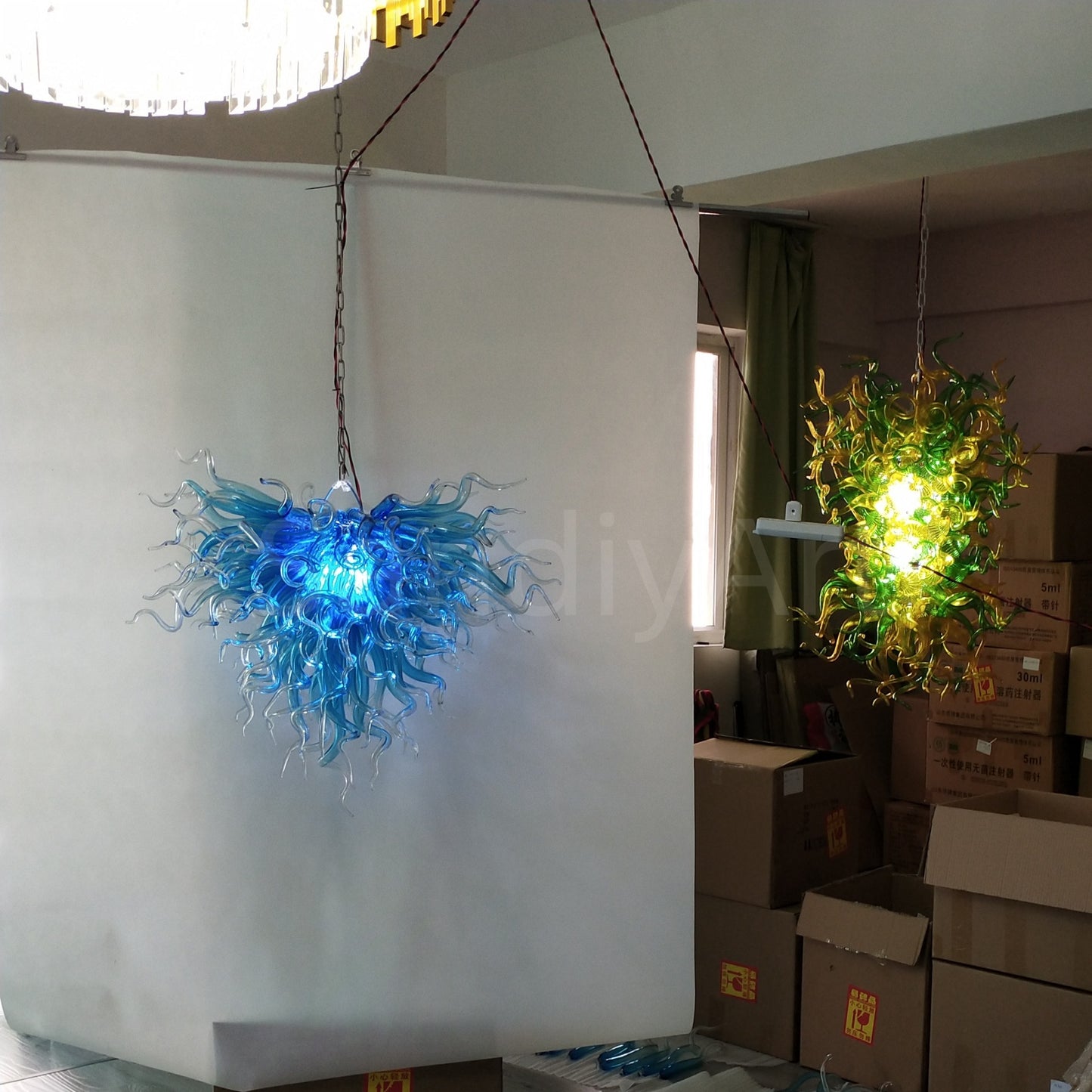 Blue with clear custom blown glass chandeliers Inspired by Chihuly style lighting