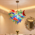 Vibrant multicolor hand-blown floral glass chandelier from SandiyArt hanging above an elegant dining table, Chihuly-style organic flower pendant light as a luxury statement decor for modern dining room interior