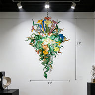 Inspiration from nature Custom glass chandelier with green leaves and red orange pink flowers