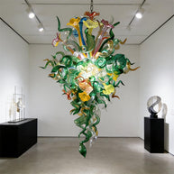 Inspiration from nature Custom glass chandelier with green leaves and red orange pink flowers