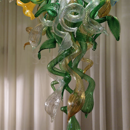 Inspiration from nature Custom glass chandelier with green leaves and red orange pink flowers