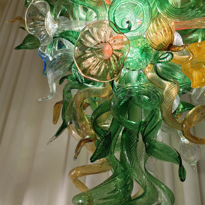 Inspiration from nature Custom glass chandelier with green leaves and red orange pink flowers