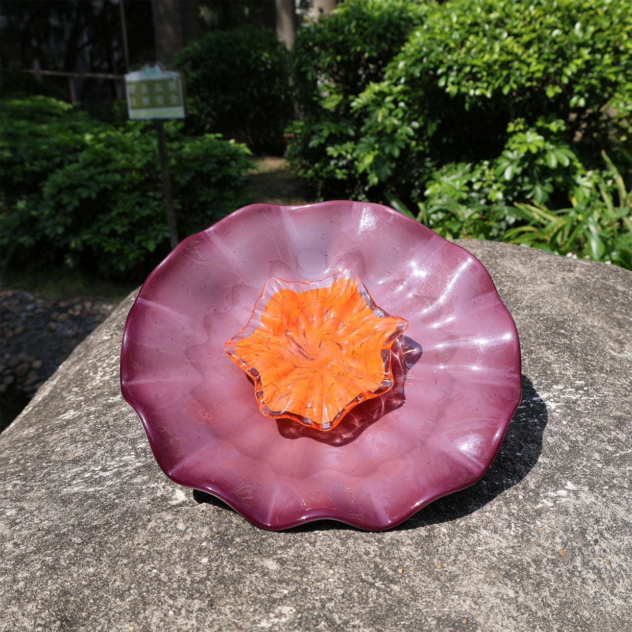 Hand made purple glass flowers wall decoration Where to buy similar Chihuly glass in Seattle